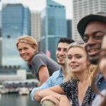 People standng on bridge