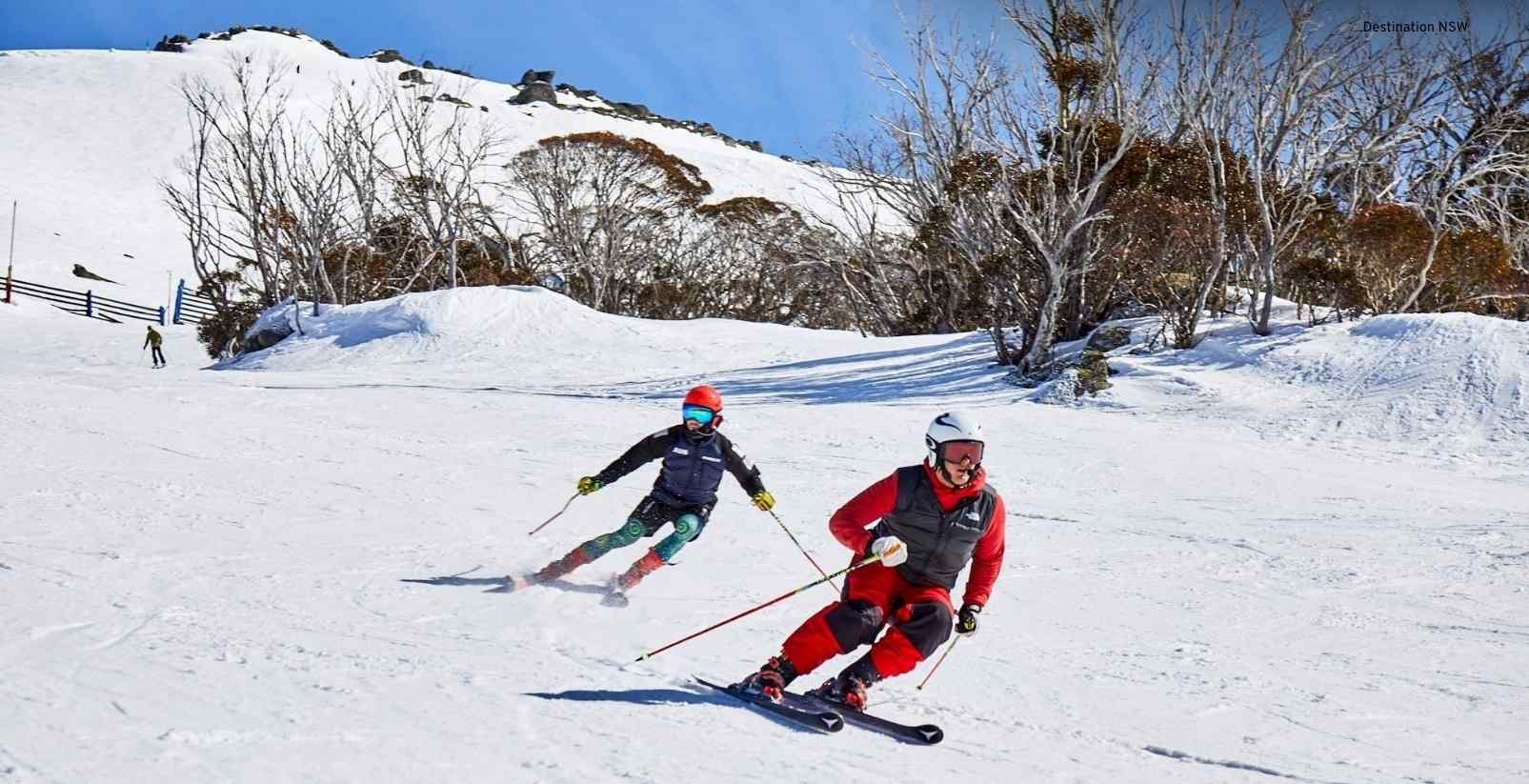 People skiing down hill